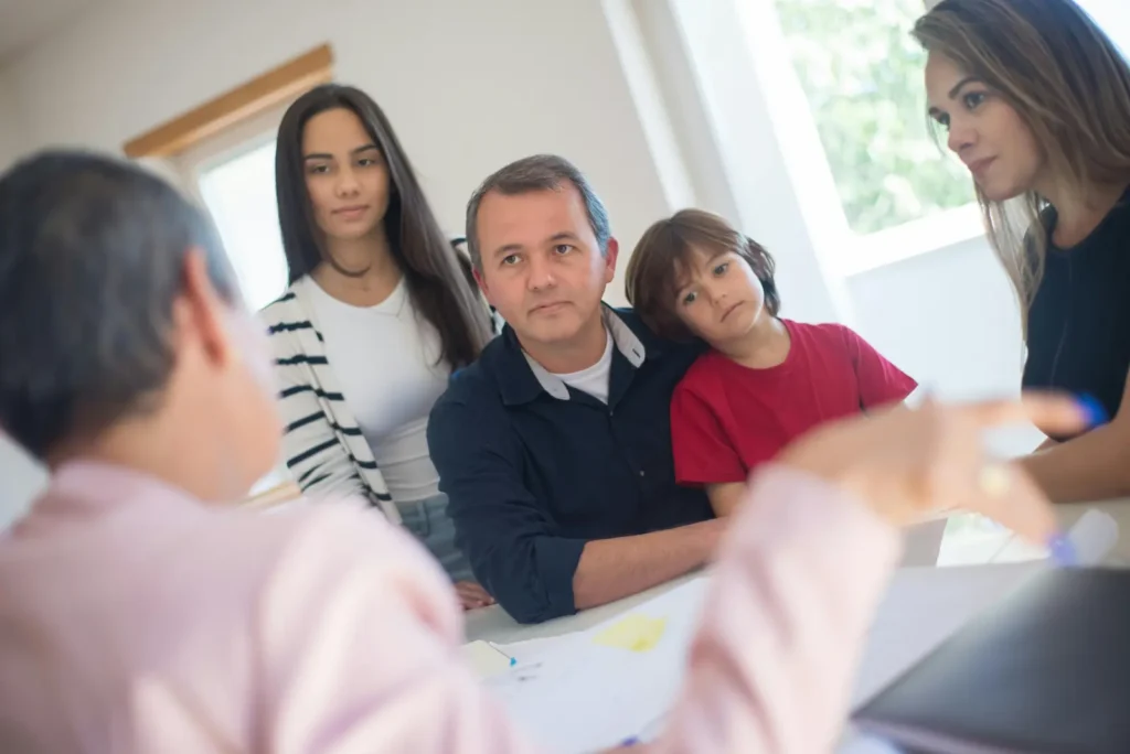 Therapia clinician reviewing support plan goals with a family in Victoria
