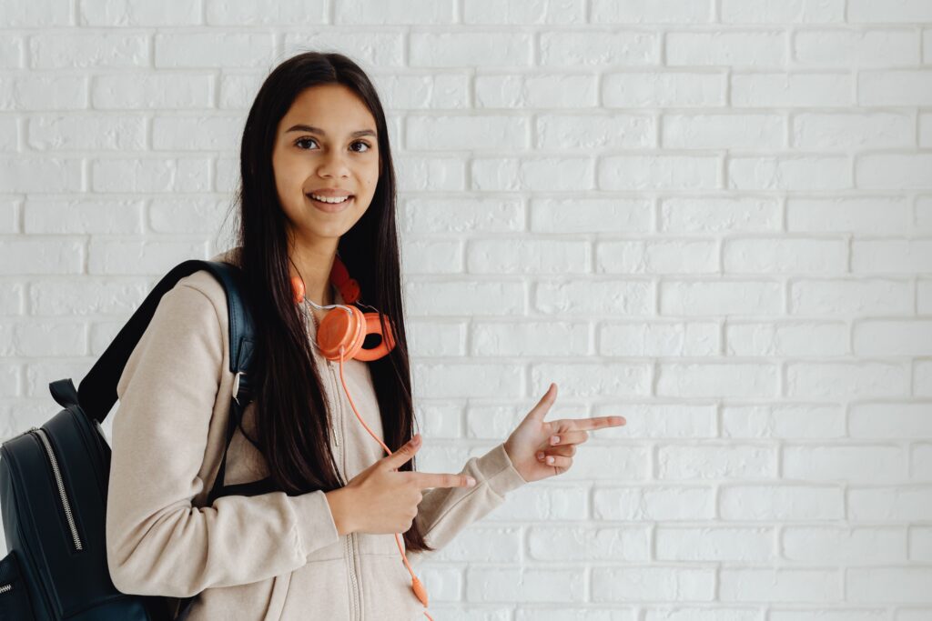 A confident teenager after participating in a therapia community participation activity.